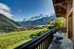 Experience breathtaking mountain views from this charming chalet.