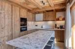 Experience rustic elegance in this stunning kitchen.