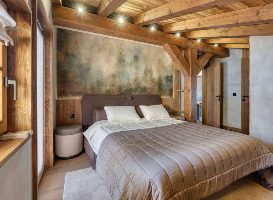 Experience rustic elegance in this stunning bedroom.