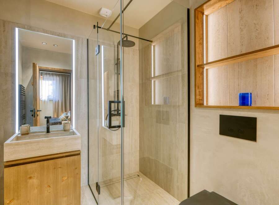 Experience modern luxury in this stunning bathroom.