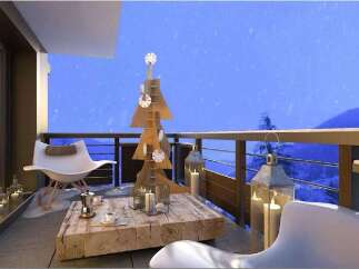 Cozy balcony with stunning mountain views, perfect for enjoying a winter evening.