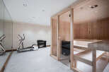 This stunning home boasts a luxurious, in-home gym and sauna, perfect for relaxation and fitness.