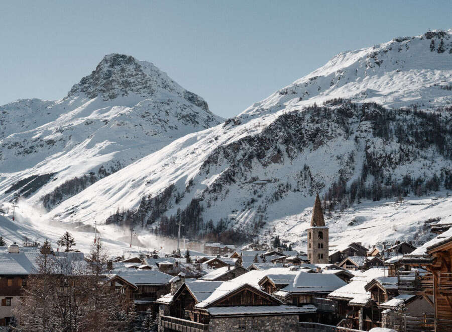Nestled in a picturesque winter wonderland, this stunning property offers breathtaking mountain views and a charming village setting.