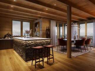 This stunning property boasts a spacious open-plan living area with a large stone island perfect for entertaining.