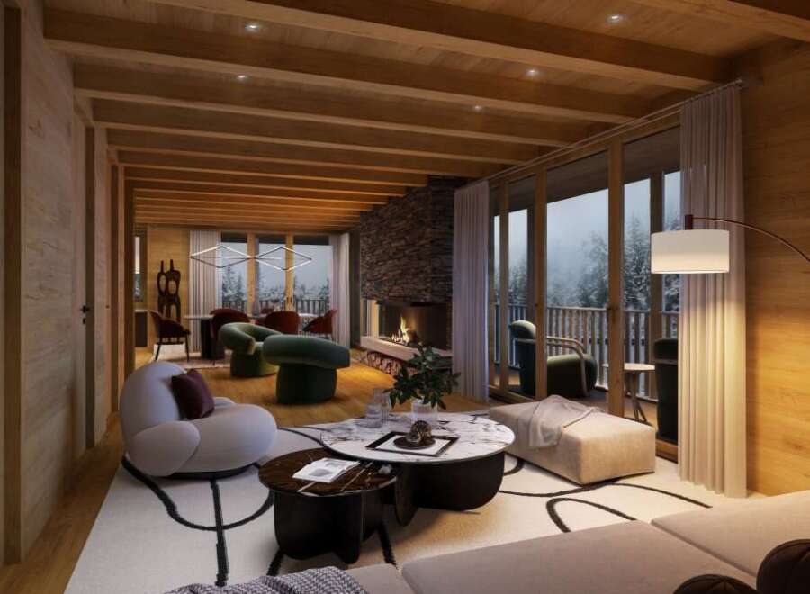 Luxury chalet with stunning mountain views and a spacious open-plan living area.