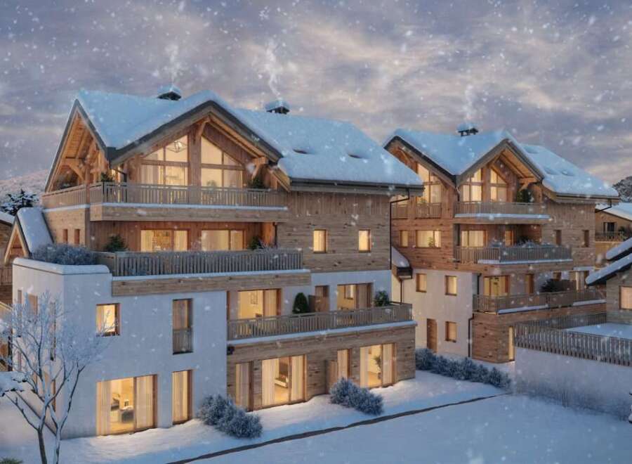 Luxury chalet apartments in a stunning snowy mountain setting.
