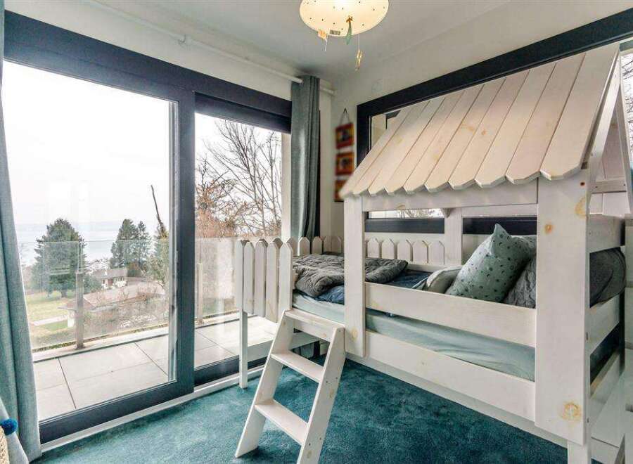 This stunning property boasts breathtaking views from its large windows and private balcony.
