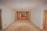 Discover the charm of this inviting space, featuring warm wooden floors and a bright, airy atmosphere.
