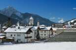 Experience the charm of this picturesque village nestled amidst snow-capped mountains.