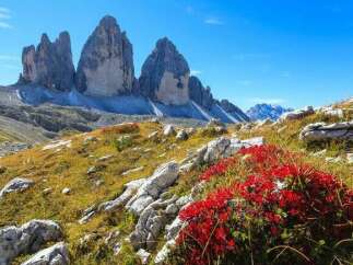 Explore the breathtaking beauty of the Tre Cime di Lavaredo in the Italian Dolomites.