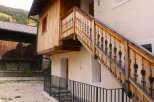 Discover the charm of this unique property featuring a beautifully crafted wooden staircase.