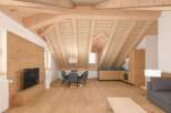 Experience the charm of this stunning wooden-clad apartment, featuring a unique sloped ceiling design.