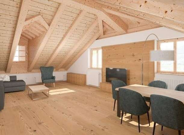 Experience the charm of this stunning attic apartment, featuring a warm and inviting wooden interior.