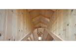Explore the stunning architectural details of this wooden structure.