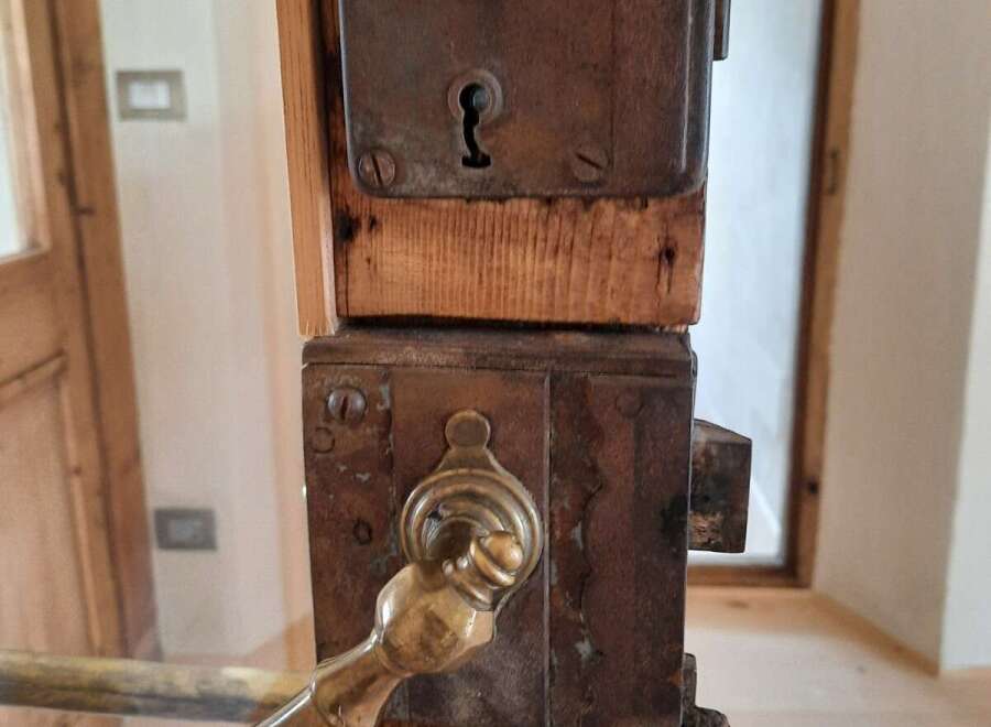 Explore the charm of this property, featuring a unique antique door lock.