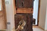 Explore the charm of this property, featuring a unique antique door lock.