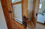 Discover the charm of this property with its beautifully crafted wooden doors.