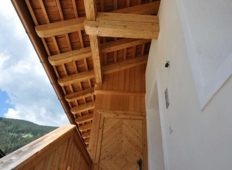 Discover the charm of this property, showcasing exquisite wooden architecture.