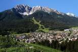 Discover the breathtaking beauty of this mountain town nestled at the foot of majestic peaks.