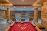 Indulge in luxury with this stunning property featuring a private pool and a game room.