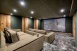 Step into luxury with this stunning home theater.