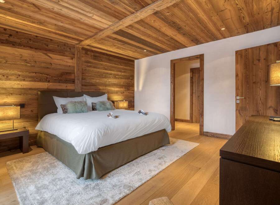 Experience rustic elegance in this stunning bedroom.