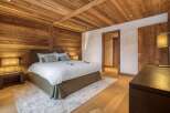 Experience rustic elegance in this stunning bedroom.