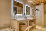 Indulge in the luxurious ambiance of this stunning bathroom.