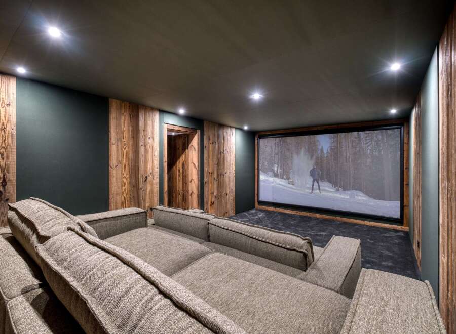 Step into luxury with this stunning home theater.