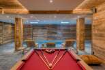 Indulge in luxury with this stunning property featuring a private pool and a game room.