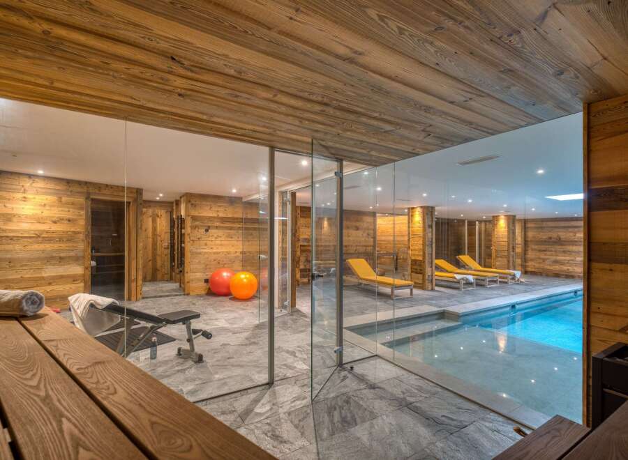 Indulge in luxury at this stunning property featuring a private indoor pool and a well-equipped gym area.