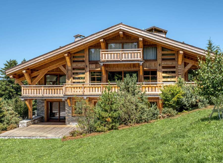 Experience the epitome of alpine luxury in this stunning wooden chalet.