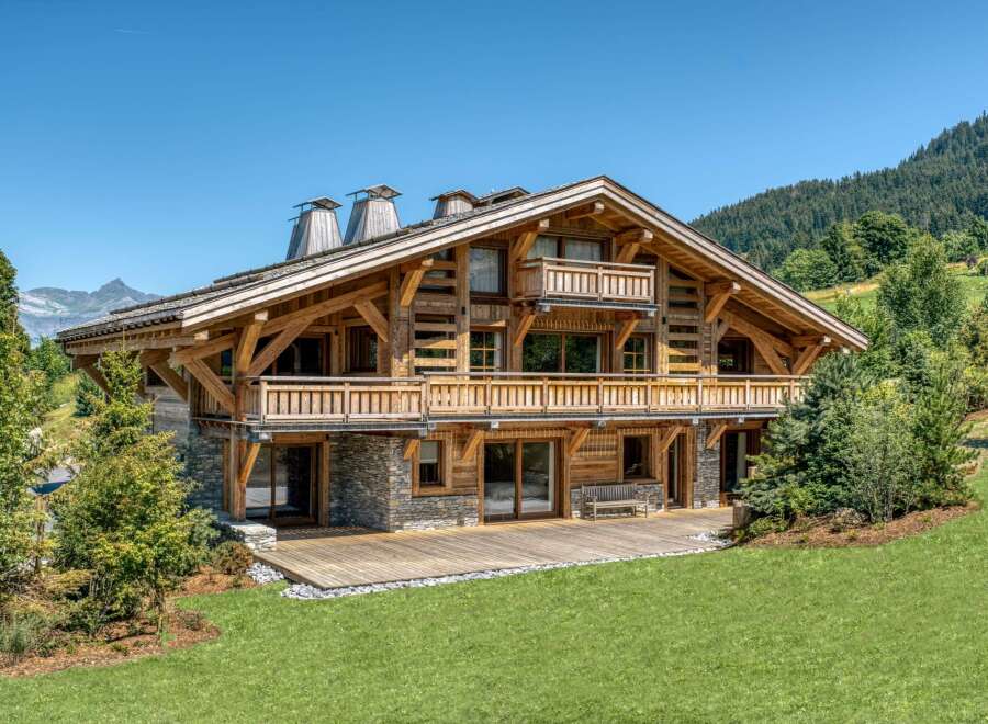 Experience the epitome of alpine luxury in this stunning wooden chalet.