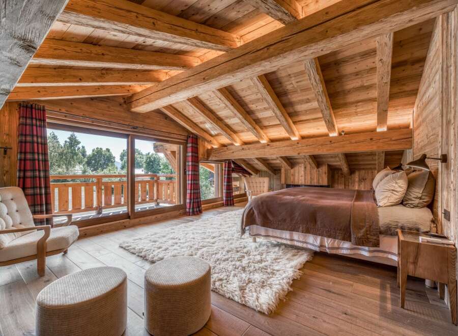 Experience the ultimate in rustic luxury in this stunning bedroom.