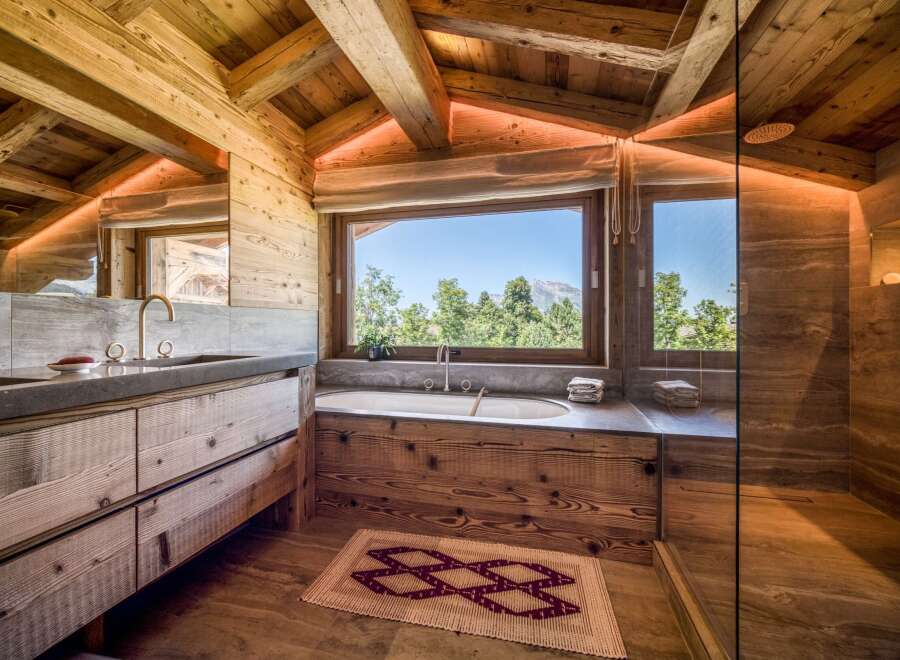 Experience rustic luxury in this stunning bathroom.