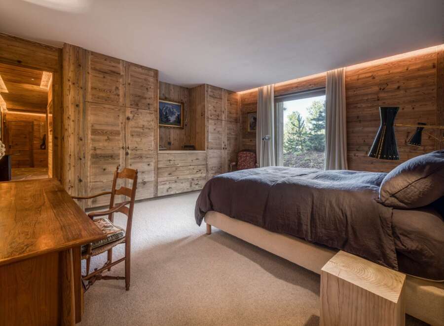 Experience rustic elegance in this stunning bedroom.