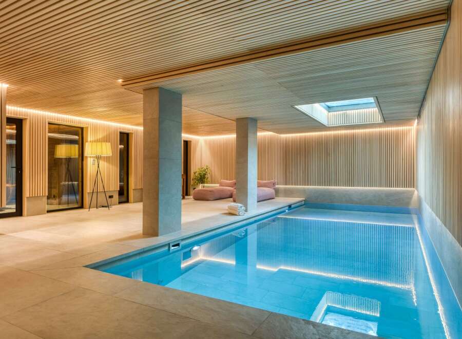Indulge in luxury with this stunning indoor pool.