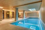 Indulge in luxury with this stunning indoor pool.
