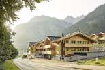 Nestled in the Austrian Alps, this stunning apartment complex offers breathtaking mountain views and modern amenities.