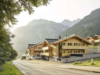 Nestled in the Austrian Alps, this stunning apartment complex offers breathtaking mountain views and modern amenities.