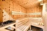 Indulge in ultimate relaxation in this exquisite sauna, meticulously crafted from premium light wood.