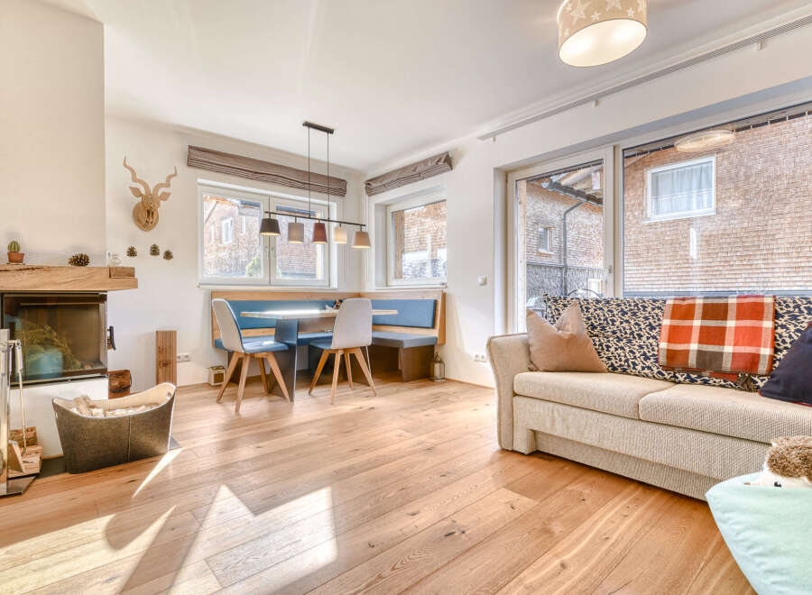 This charming property boasts a cozy living space with a fireplace, perfect for relaxing evenings.