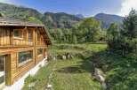 This stunning chalet boasts a prime location in the heart of the French Alps, offering breathtaking mountain views.