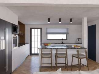 Modern kitchen with herringbone floors and sleek appliances.