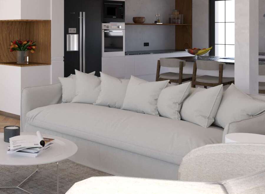 Stunning open-plan living space seamlessly blending modern kitchen and cozy living area.