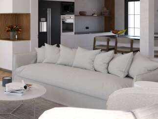 Stunning open-plan living space seamlessly blending modern kitchen and cozy living area.