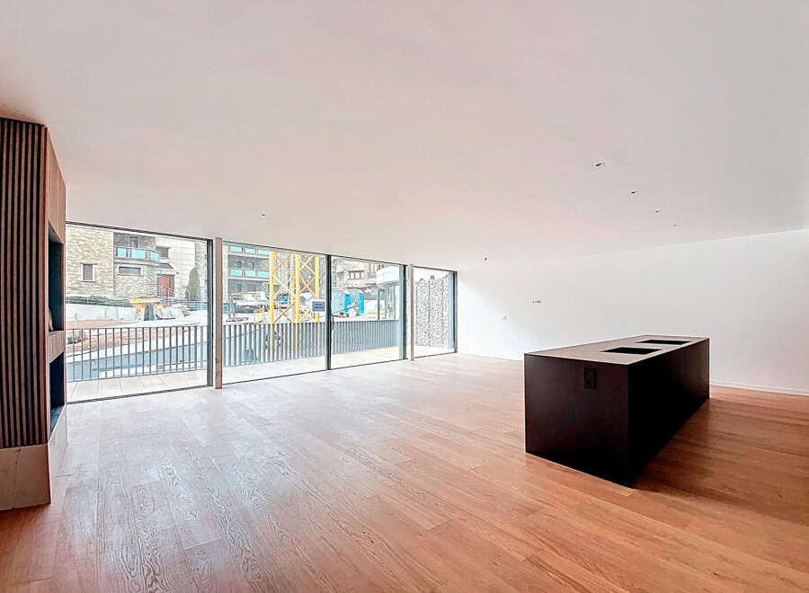 Stunning open-plan living space with expansive windows offering breathtaking views.