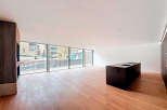 Stunning open-plan living space with expansive windows offering breathtaking views.