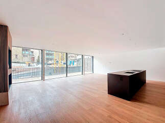 Stunning open-plan living space with expansive windows offering breathtaking views.