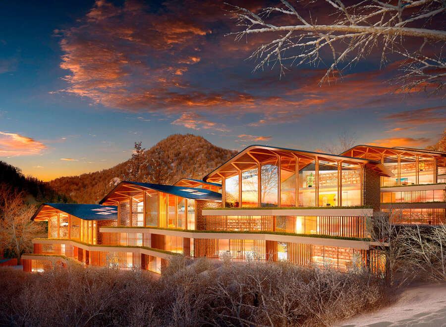 Luxury mountain retreat nestled in a snowy landscape.